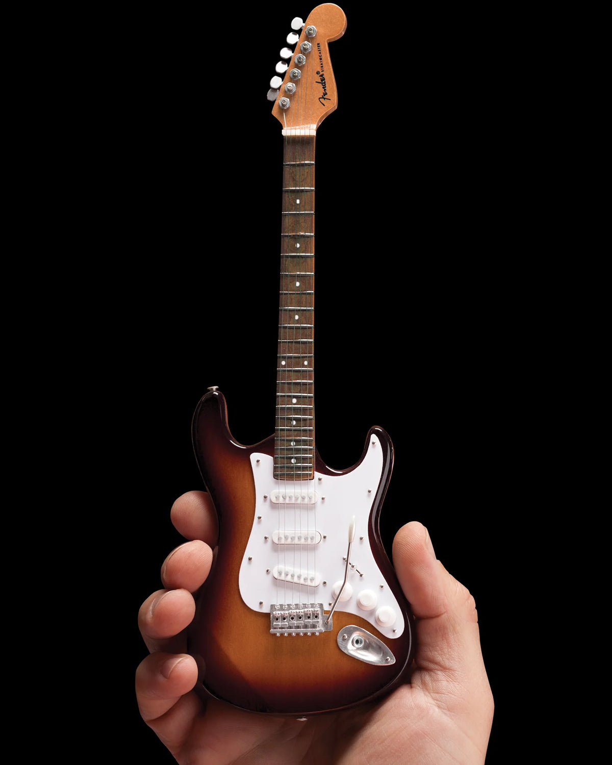 Full Fender Stratocaster sunburst miniature against black — Slide 6 of 6