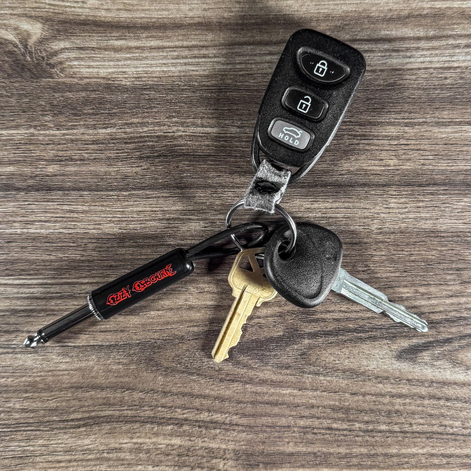 P Pluginz Ozzy Osbourne Jack Rack key hanger — Ozzy Osbourne guitar-plug keychain attached to car keys — Slide 7 of 9