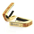 Thalia gold finish capo with AAA Hawaiian Koa inlay