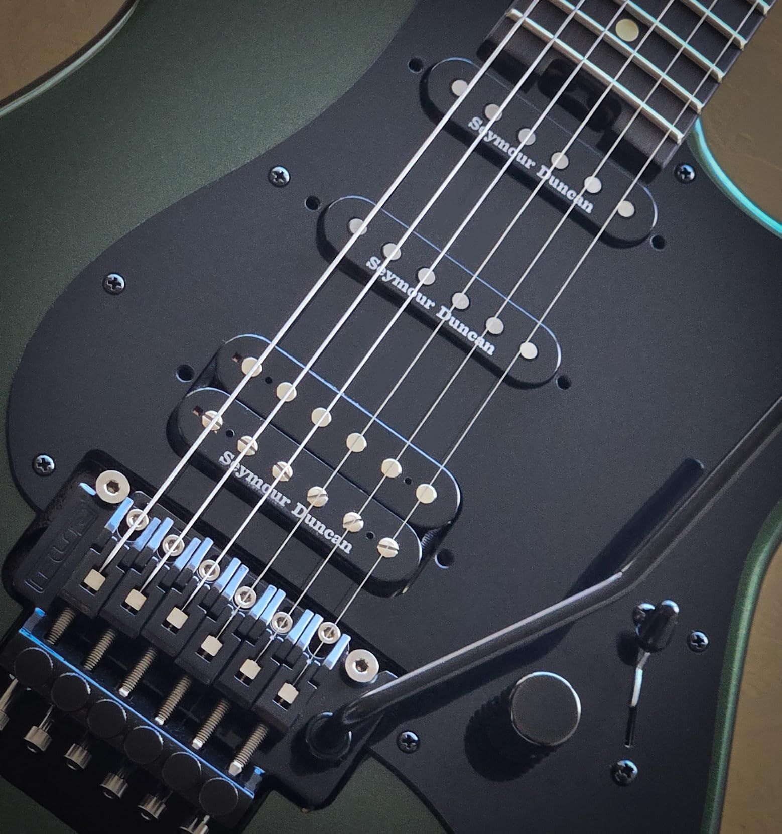 GHS GBM Boomers 11–50 electric guitar strings, six-pack — strings installed on a black electric guitar — Slide 8 of 9