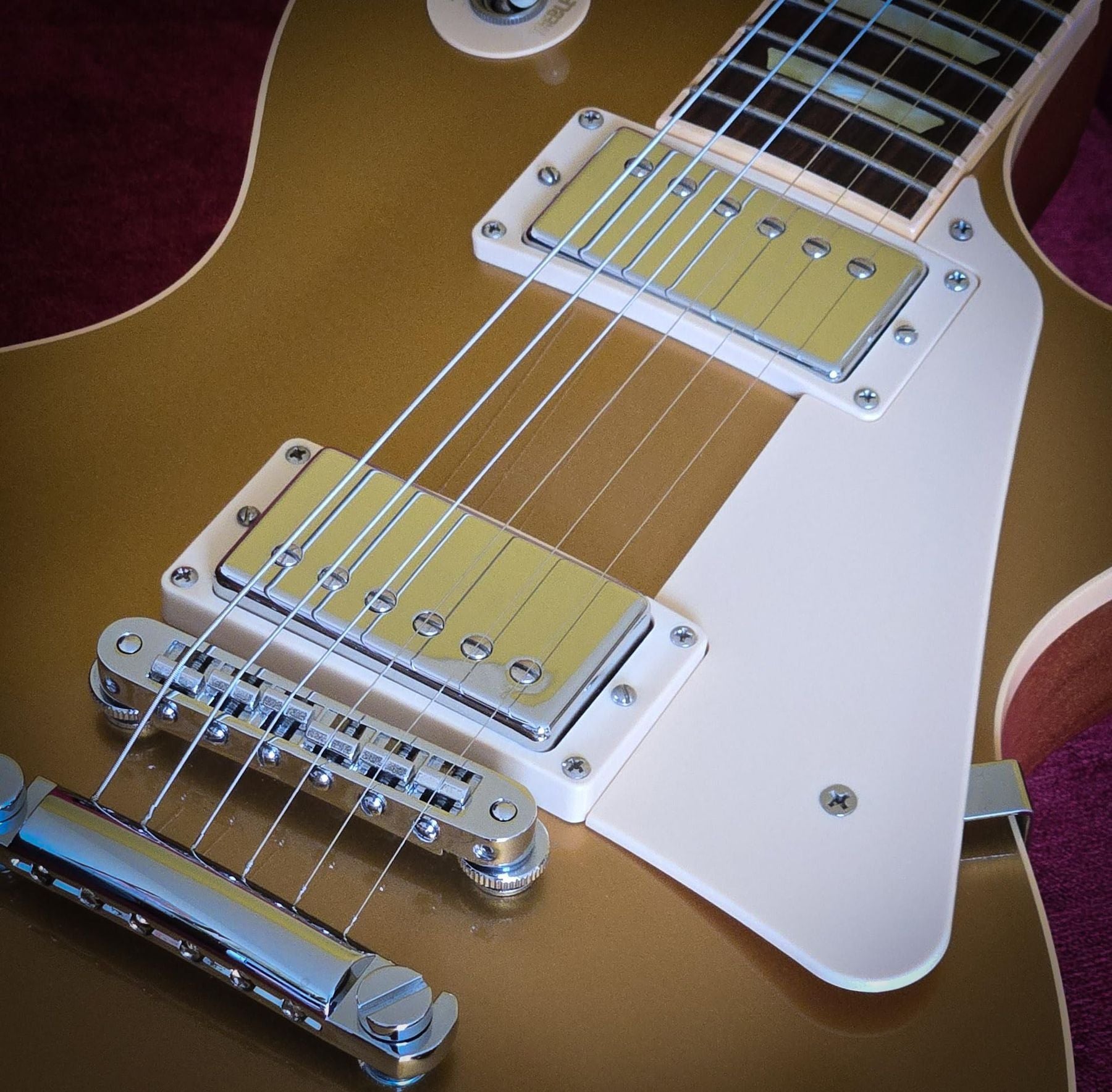 GHS GBM Boomers 11–50 electric guitar strings, six-pack — strings installed on a gold electric guitar — Slide 9 of 9