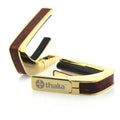 Thalia 24k Gold Finish Capo with Crimson Paua Inlay – Premium Guitar Capo with Universal Fretpads for Acoustic, Electric, 6 & 12-String, Classical & Ukulele – Smooth Tuning & Elegant Design